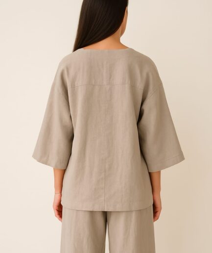 Linen co-ord set, beige outfit, oversized top, wide-leg pants, minimalist clothing, relaxed fit outfit, breathable fabric, neutral fashion, lounge co-ord, comfy co-ord set, timeless fashion, travel-friendly outfit, sustainable style, casual chic set